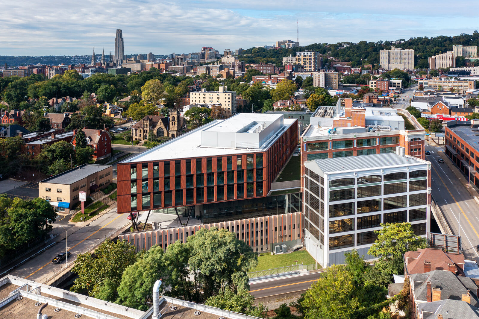 Aerial view of the Assembly surrounded by the city of Pittsburgh