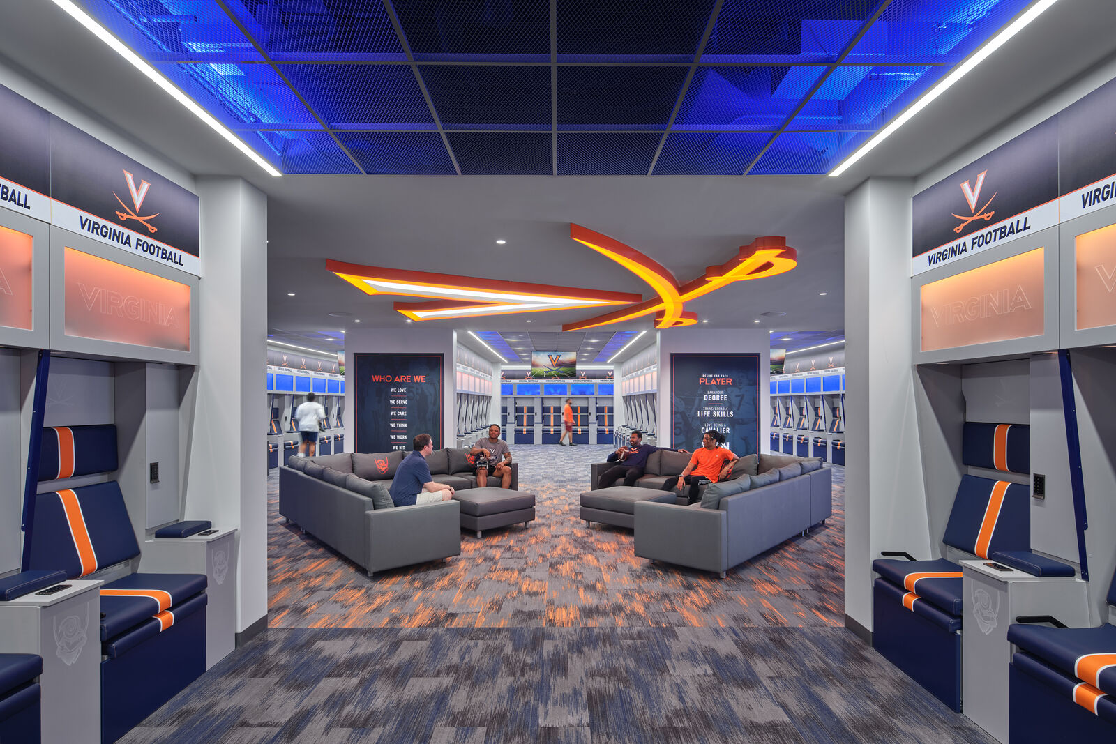 An expansive player locker room provides ample seating for pre-game huddles and post-game debriefs. 