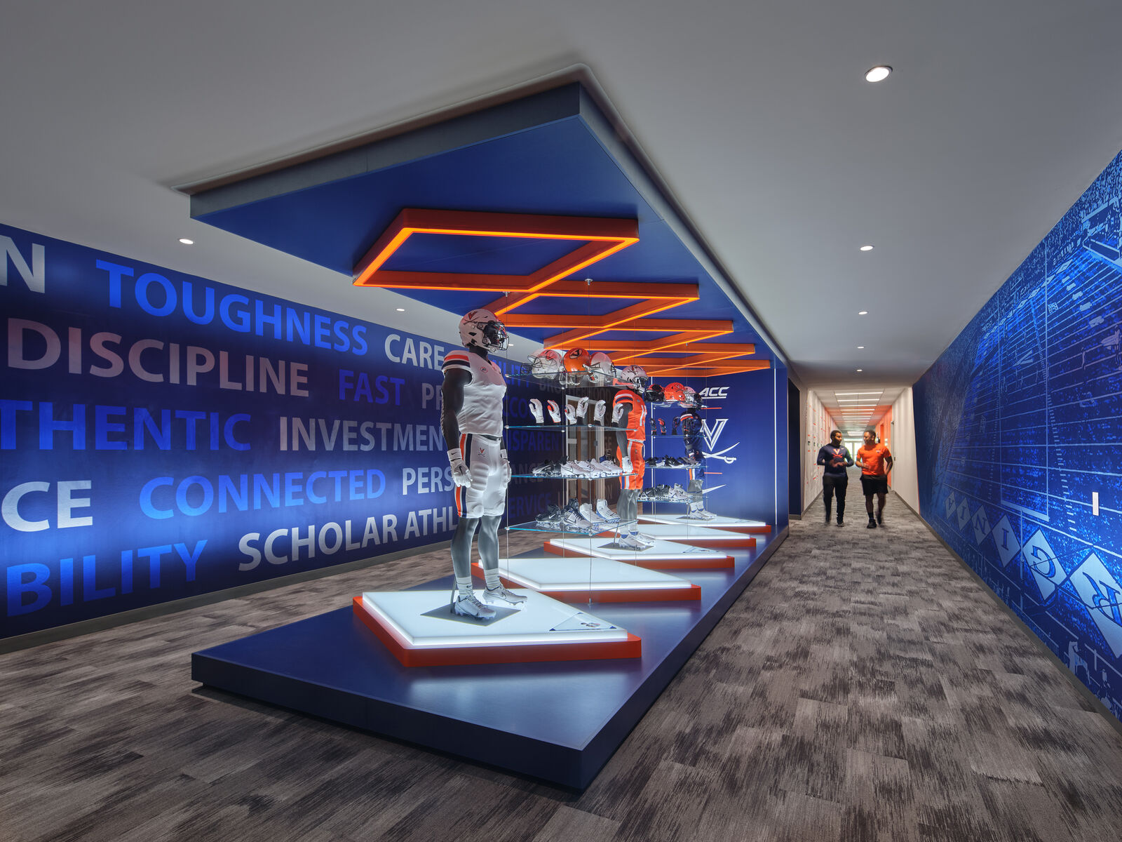 A memorial gear display features all parts of the team's football equipment.
