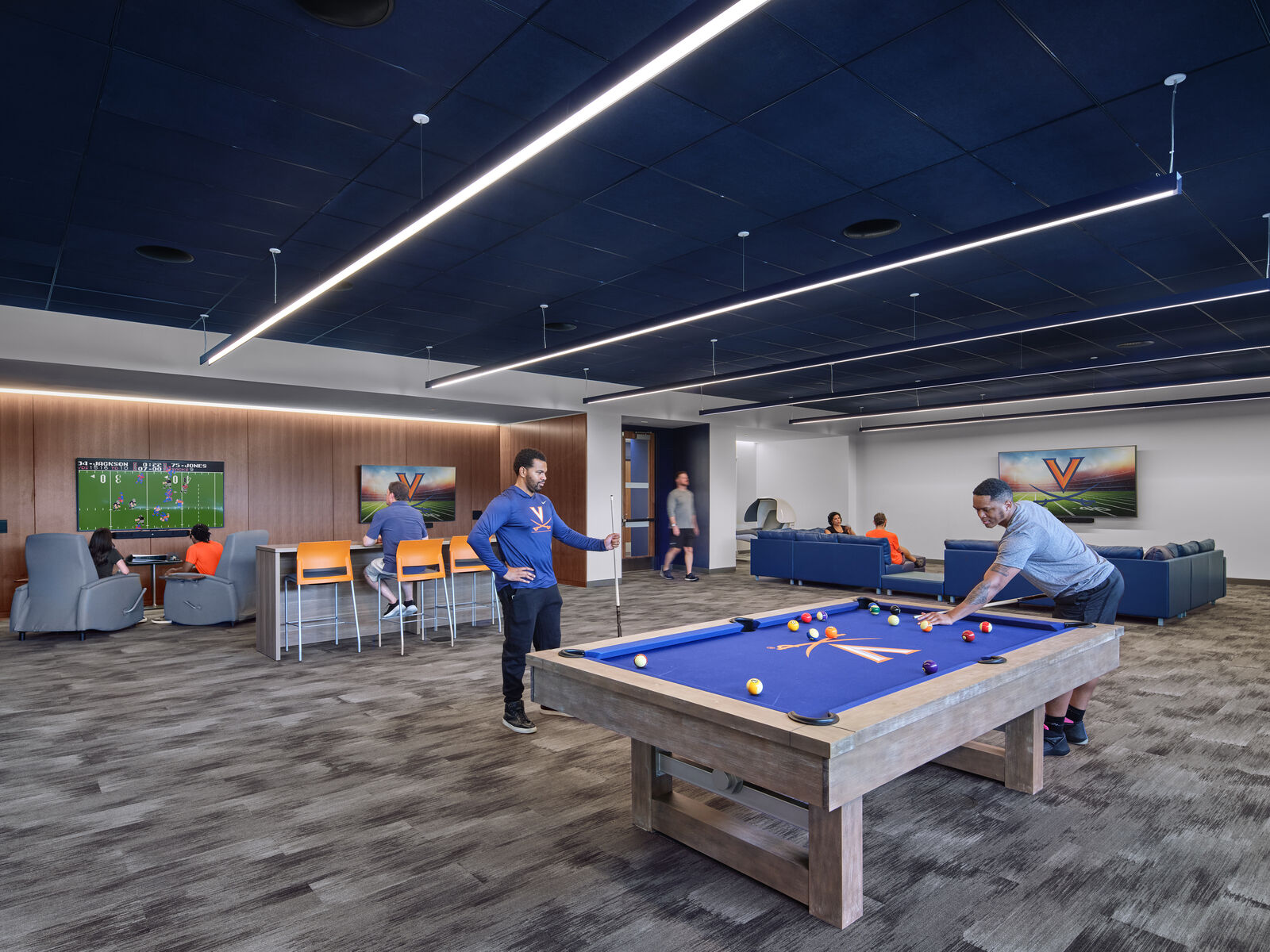 The player lounge includes a variety of amenities, from pool tables to video games, for athletes to unwind and relax in their free time. 