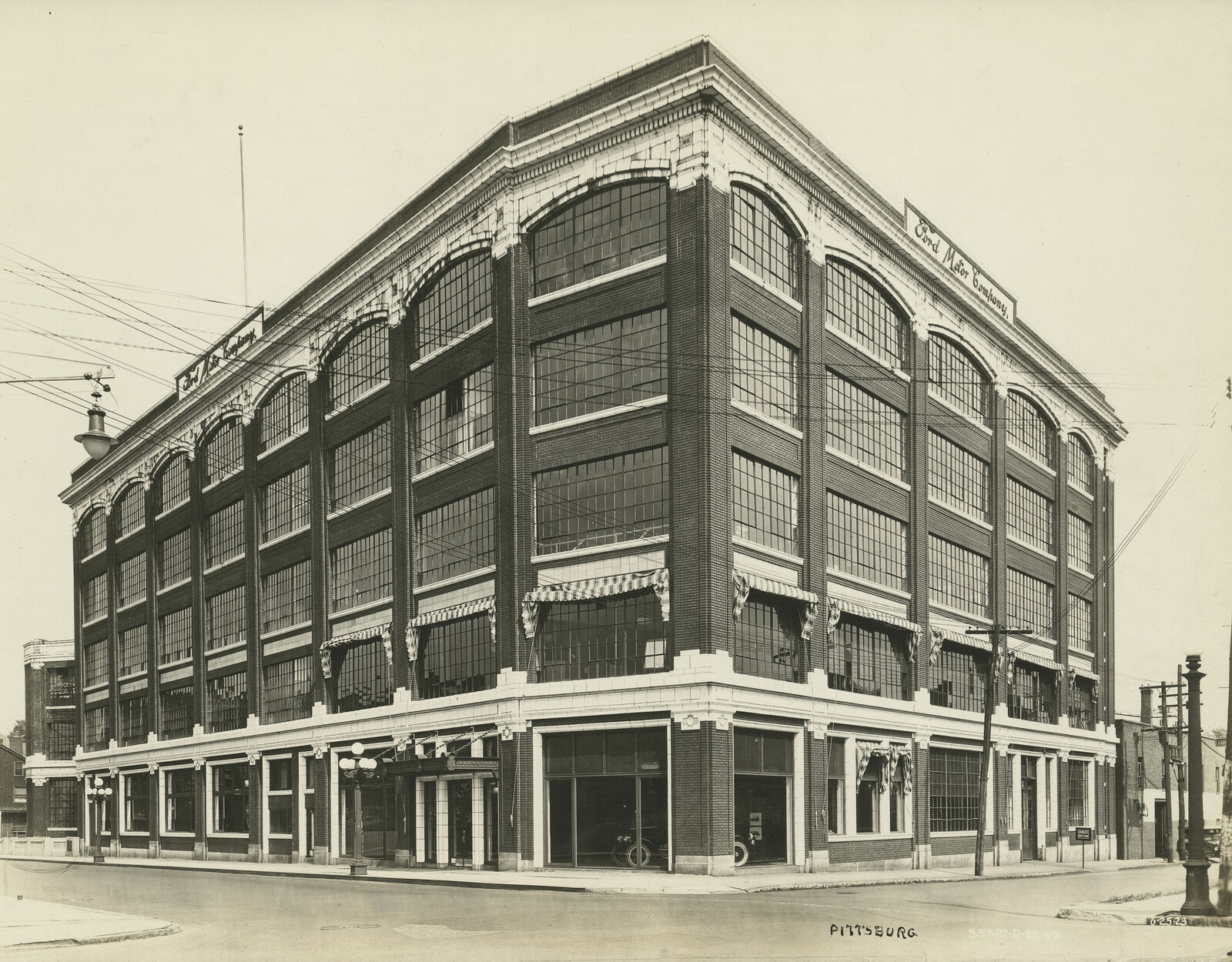 black and white shot of original building entrance.