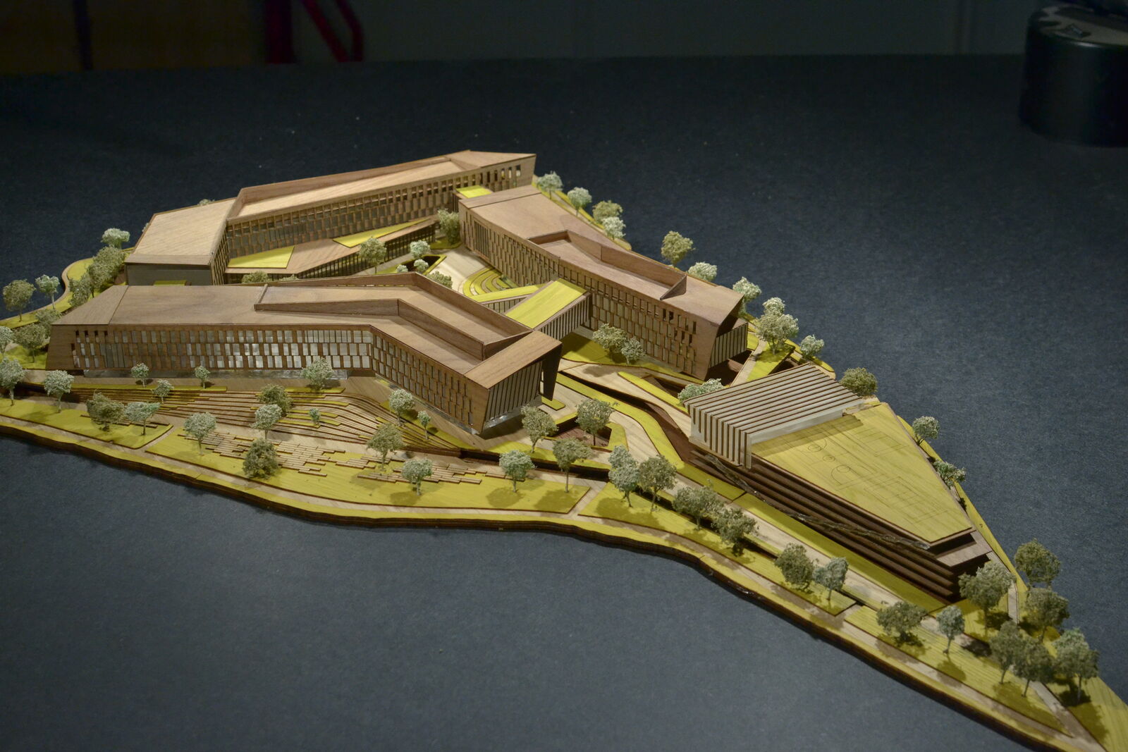 Overall model for the IQHQ structure featuring miniature models of buildings and landscaping elements.  