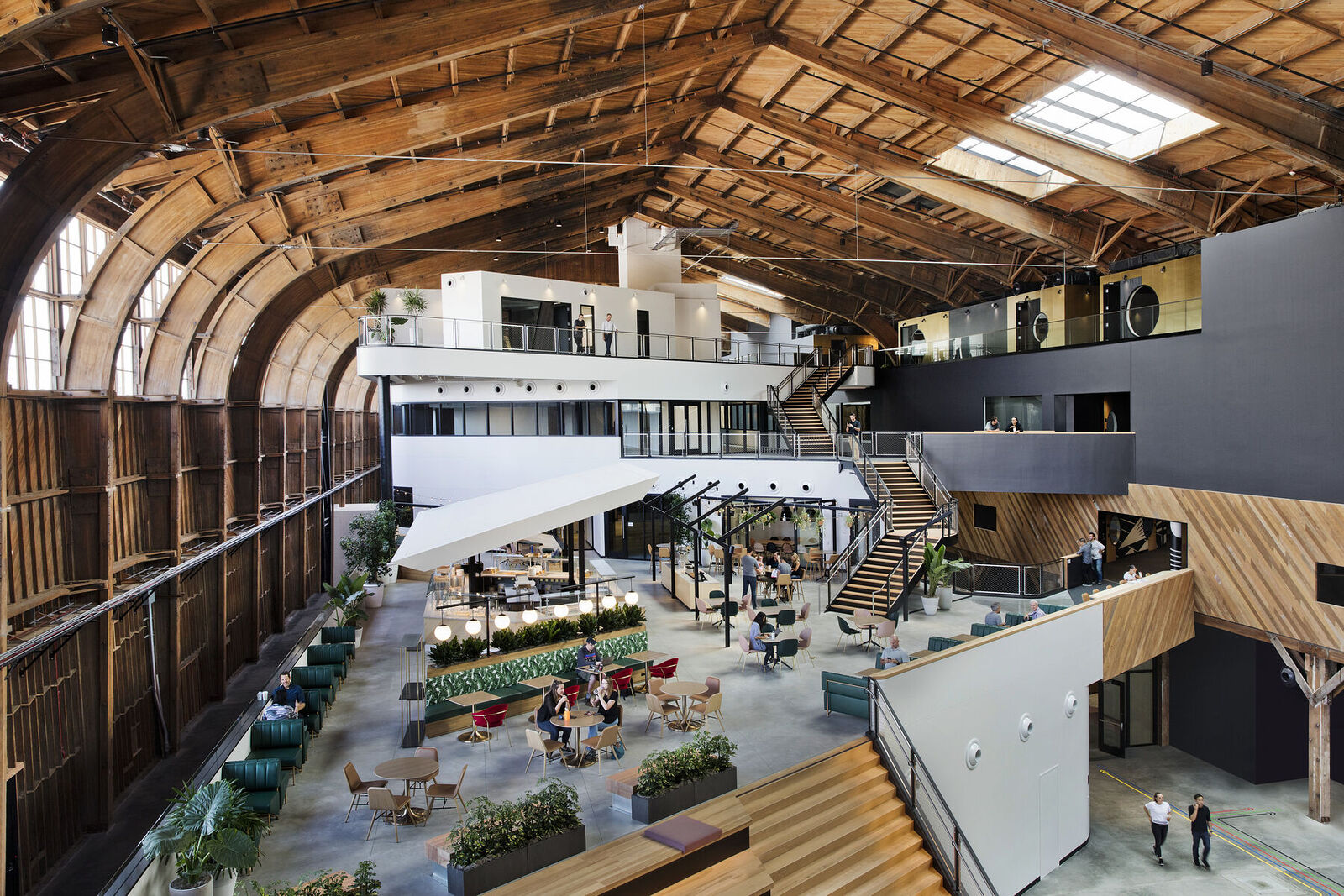 Interior view of office space in wooden airport hanger. 