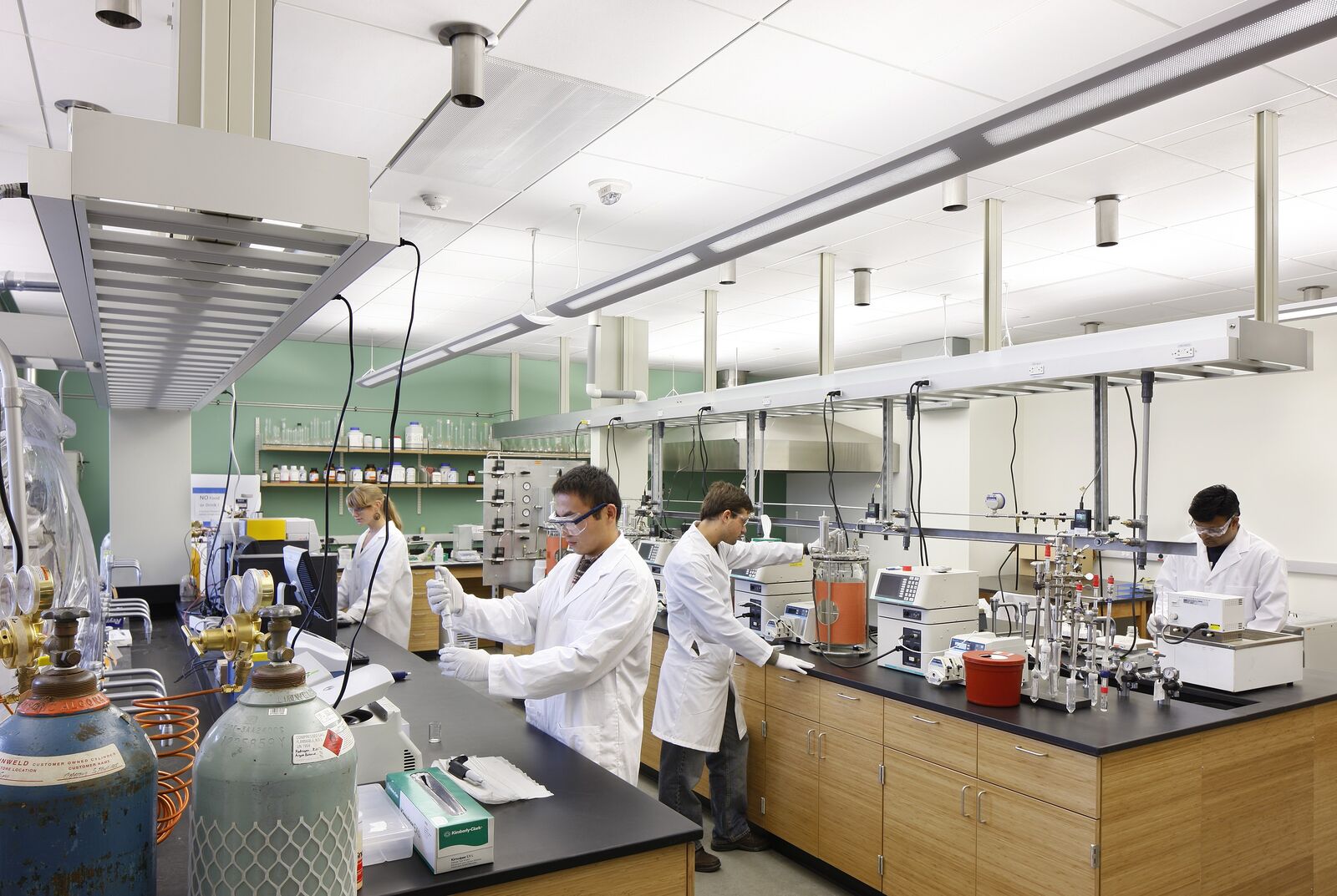 Interior photo of a labratory with scientists working inside